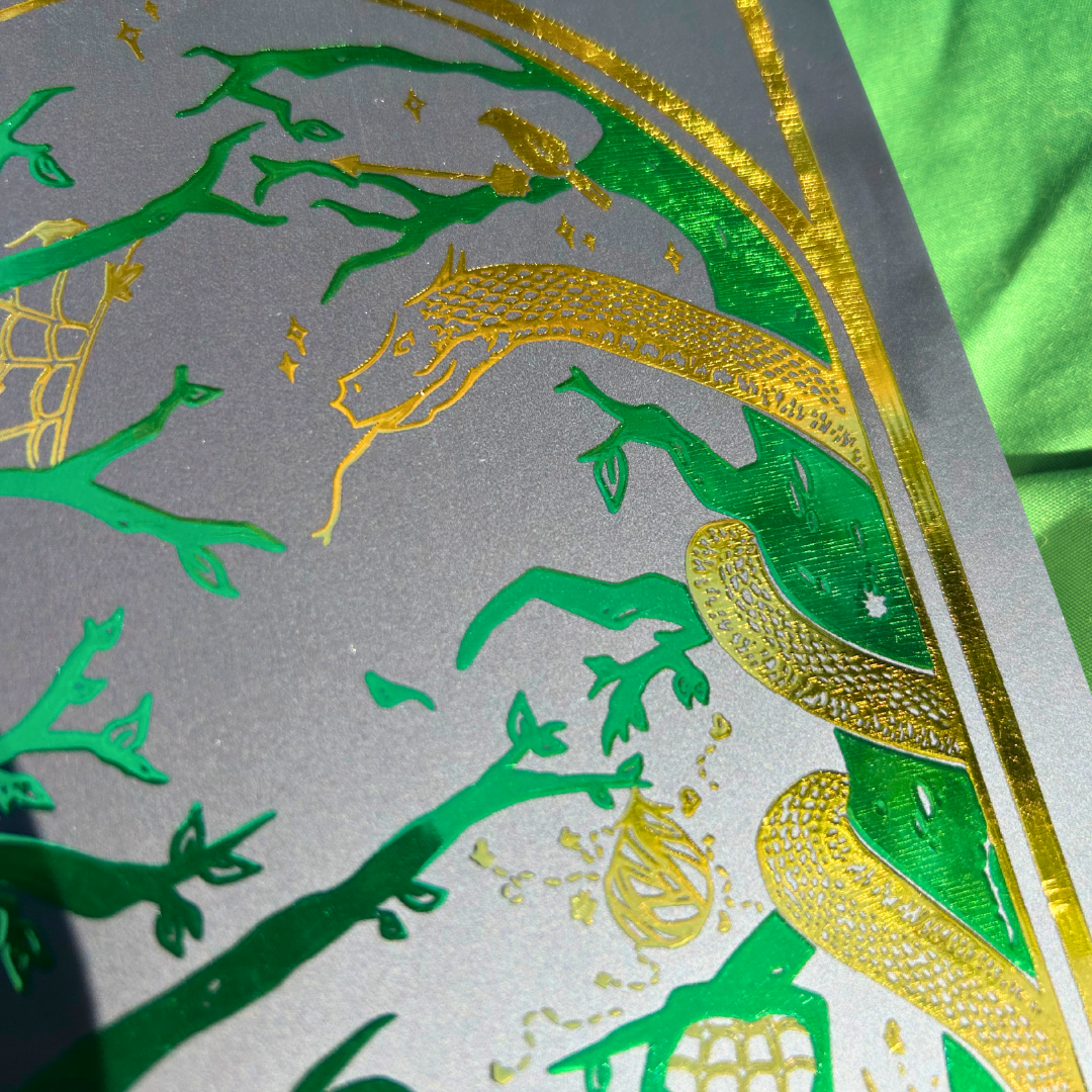 Decorative paper with gold and green dragon design on a gray background