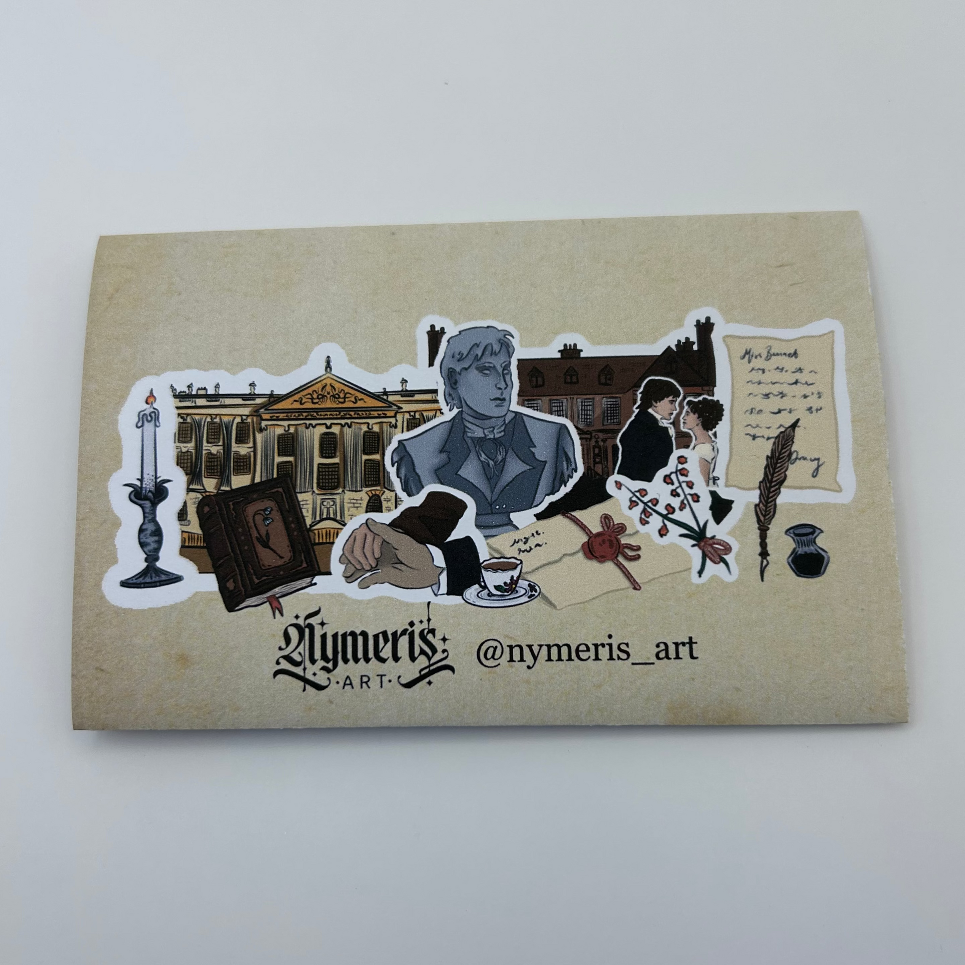 Sticker set on a brown envelope with 'Nymeris Art' branding