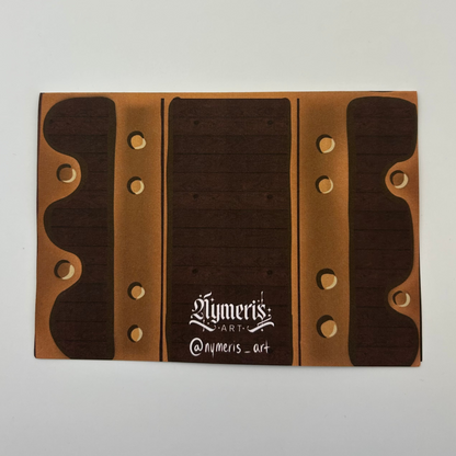 Wooden business card holder with brand name on a light gray background